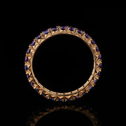 purple sapphire and rose gold eternity ring fishtail set