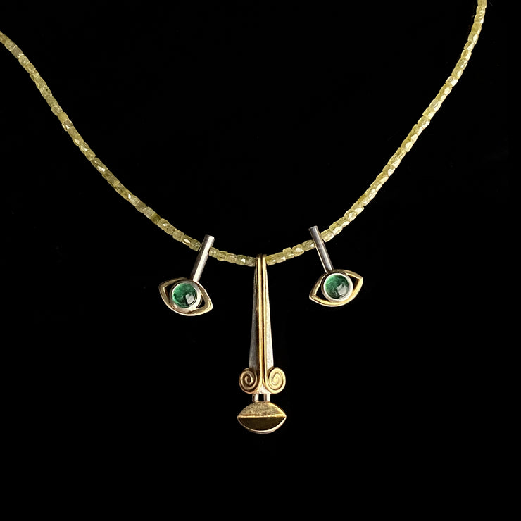 Triptych Face, yellow diamond necklace,