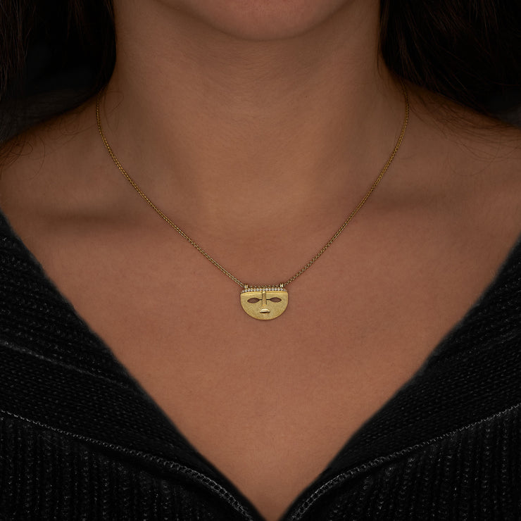 The Dreamer Mask pendant in 18ct yellow gold