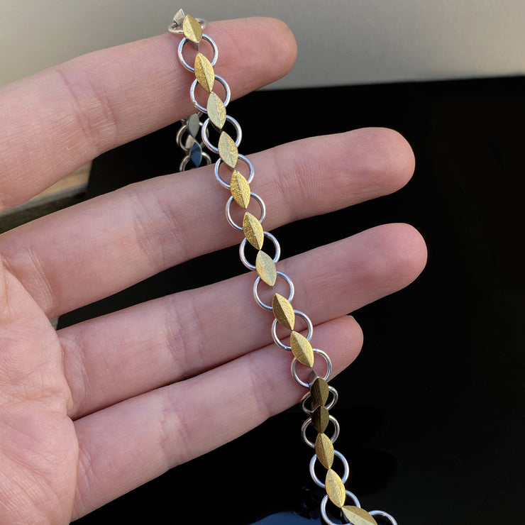Leaf bracelet in silver and gold.