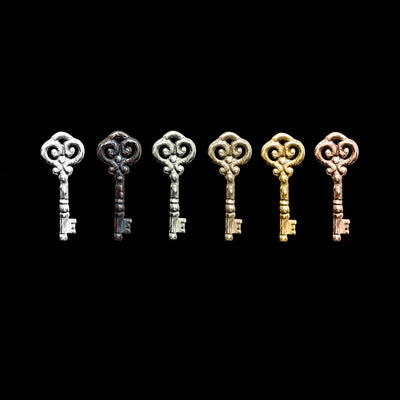 Key - Curio ear stud