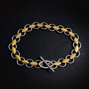 Leaf bracelet in silver and gold.