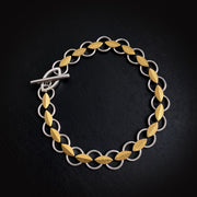 Leaf bracelet in silver and gold.