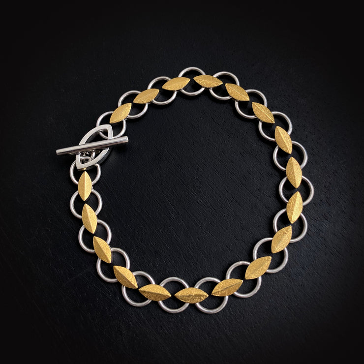 Leaf bracelet in silver and gold.