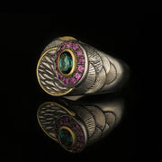 silver and gold signet ring with blue tourmaline and garnets, hand engraved