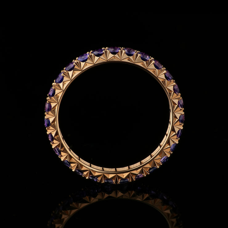 purple sapphire and rose gold eternity ring fishtail set