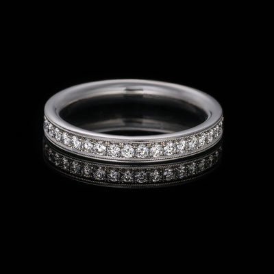 diamond and platinum full eternity ring with milgrain edge
