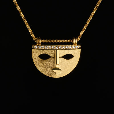 aztec inspired gold mask pendant with diamonds