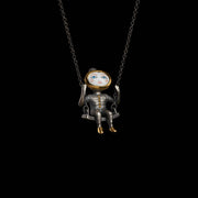 Nina on a swing necklace